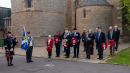 The wreath layers assemble prior to laying wreaths at the War Memorial