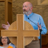 Rev Fergus Cook welcomes everyone