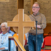Rev Dan Robertson reads the lesson from the Bible