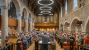 Paul Gudgin conducts the choir