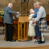  Rev Fergus Cook prepares for the Baptism