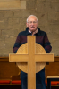Alan Hunter reads the lesson from the Bible