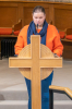 Amy Foster reads the lesson from the Bible